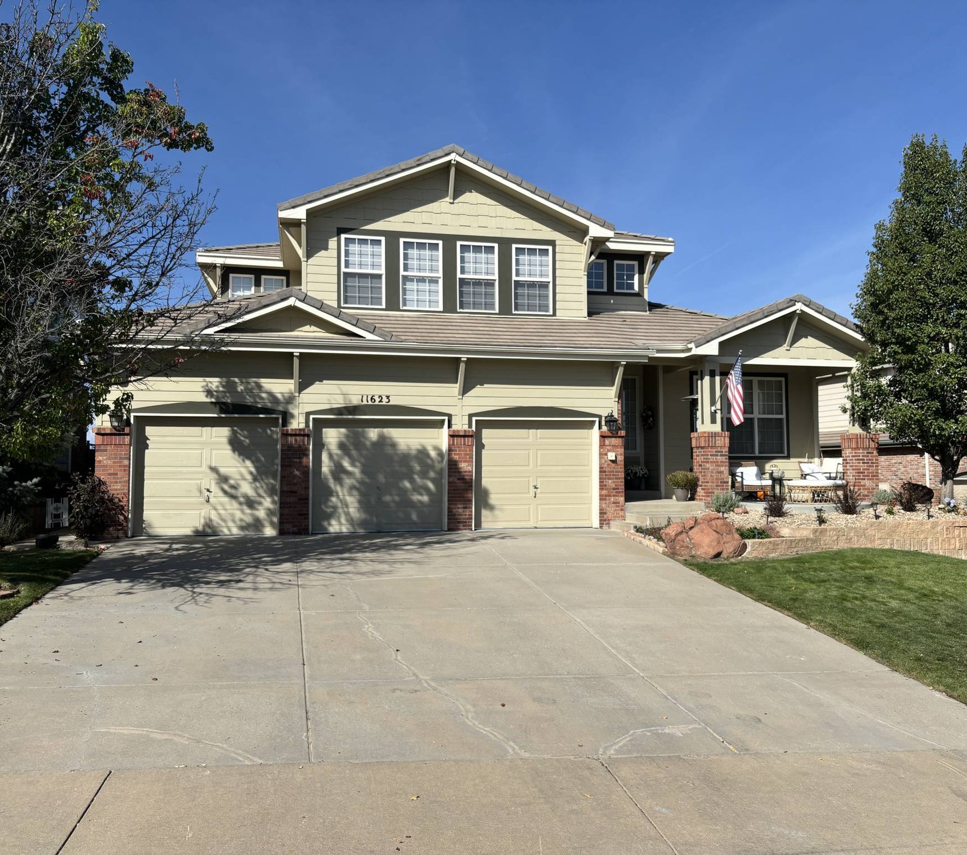 Completed asphalt shingle roof on a Douglas County home